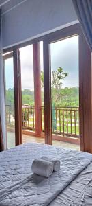 Giường trong phòng chung tại Khách sạn Đức Lộc Phát +26 ảnh