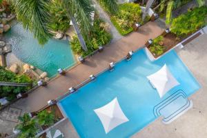 棕櫚灣的住宿－Belle Escapes Oceanview Suite 48 with Private Pool Alamanda Resort Palm Cove，相簿中的一張相片