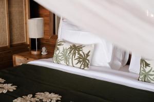 Un ou plusieurs lits dans un hébergement de l'établissement Anna Villas by Sumba-Beach