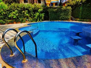 Piscina di Walk to Calangute beach from this beautiful studio o nelle vicinanze