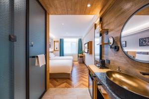 Foto Pekingis asuva majutusasutuse Qiu Guo Hotel Xidan Financial Street Beijing galeriist
