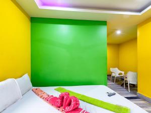 Postel nebo postele na pokoji v ubytování Hotel Utopia