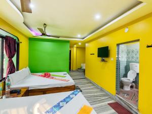 TV a/nebo společenská místnost v ubytování Hotel Utopia