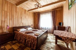 Giường trong phòng chung tại Olga Hotel SPA