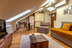 Posezení v ubytování Prime Hotel Apartmani