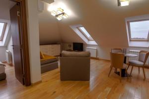 TV a/nebo společenská místnost v ubytování Prime Hotel Apartmani