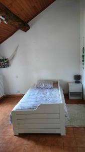 Ένα ή περισσότερα κρεβάτια σε δωμάτιο στο Au coeur de l'Aveyron