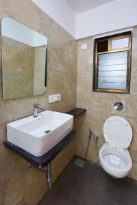 Koupelna v ubytování Astha Powai Service Apartment