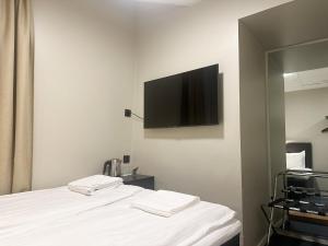 TV a/nebo společenská místnost v ubytování Hotel Hötorget