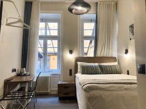 Postel nebo postele na pokoji v ubytování Hotel Hötorget