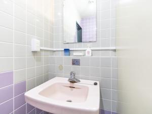 Koupelna v ubytování Tabist Hara Business Ryokan