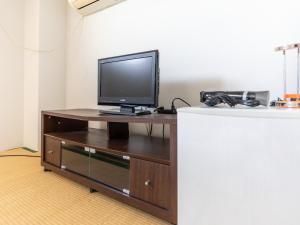 TV a/nebo společenská místnost v ubytování Tabist Hara Business Ryokan