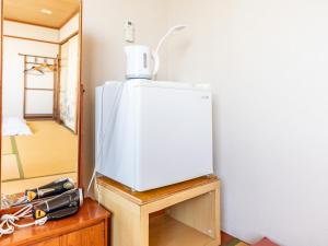 Kuchyň nebo kuchyňský kout v ubytování Tabist Hara Business Ryokan