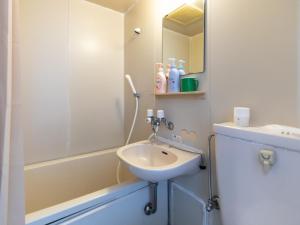 Koupelna v ubytování Tabist Hara Business Ryokan