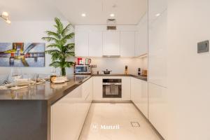 Gallery image of Manzil - 1BR Apartment in District One with Lagoon Access in Dubai