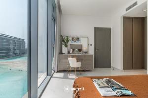Gallery image of Manzil - 1BR Apartment in District One with Lagoon Access in Dubai +11 photos