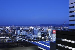 a view of a city from a building at Courtyard by Marriott Shin-Osaka Station in Osaka