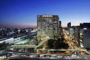 a view of a city at night with traffic at Courtyard by Marriott Shin-Osaka Station in Osaka