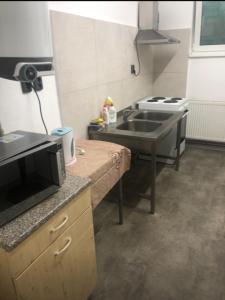 Kuchyň nebo kuchyňský kout v ubytování UBYTOVNA SK Posázavan Poříčí nad Sázavou