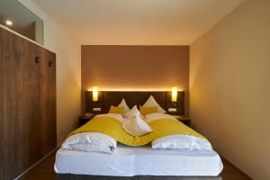 Voodi või voodid majutusasutuse Hotel Gantkofel toas