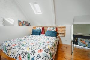 a bedroom with a bed in a room at La petite Hautière in Plouër-sur-Rance +15 photos