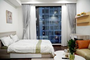 Ένα ή περισσότερα κρεβάτια σε δωμάτιο στο Vinhome Smart CiTy toà D +5 φωτογραφίες