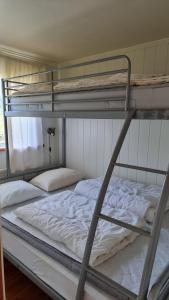 Postel nebo postele na pokoji v ubytování Saltögården