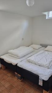 Postel nebo postele na pokoji v ubytování Saltögården