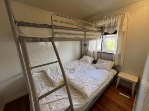 Postel nebo postele na pokoji v ubytování Saltögården