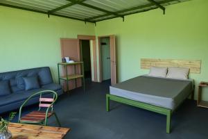 Postel nebo postele na pokoji v ubytování The Green Shack