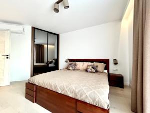 Ένα ή περισσότερα κρεβάτια σε δωμάτιο στο Apartament z widokiem na morze +10 φωτογραφίες