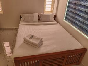 Katil atau katil-katil dalam bilik di Salite Service Apartments