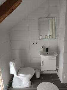 Koupelna v ubytování Kungsgården BnB