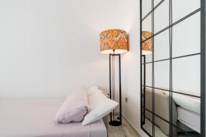 Łóżko lub łóżka w pokoju w obiekcie Avanti San Roman, para disfrutar como un sevillano mas