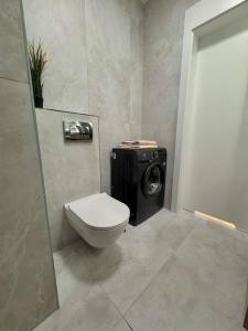 Et badeværelse på BnP Luxury Old Town 24h check-in, Business and Pleasure