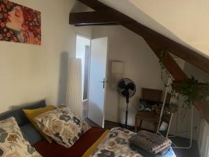 Una cama o camas en una habitación de au Mignonnet 6 fotos más