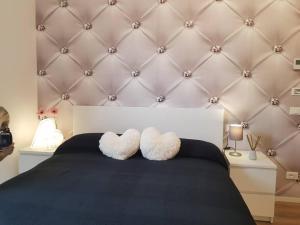 Voodi või voodid majutusasutuse Bsuites trieste in centro storico con wifi toas