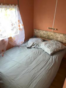 Postel nebo postele na pokoji v ubytování Le familly Team
