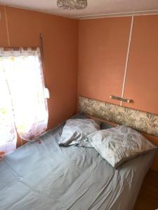 Postel nebo postele na pokoji v ubytování Le familly Team