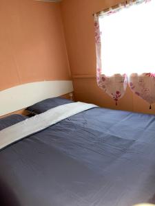 Postel nebo postele na pokoji v ubytování Le familly Team