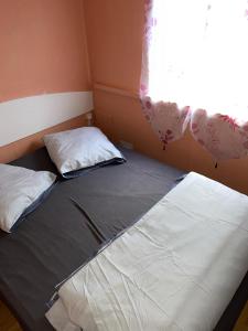 Postel nebo postele na pokoji v ubytování Le familly Team
