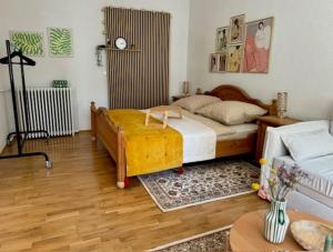 Postel nebo postele na pokoji v ubytování Residenz zu Caub - Rheinromantik