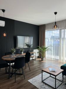 Televisyen dan/atau pusat hiburan di LTS RENT Luxury & Comfortable Villas Łąkowa