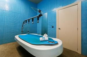 Koupelna v ubytování Hotel de Guimaraes Business & SPA