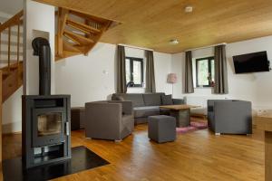 Posezení v ubytování Chalet Resort Montafon I - Chalets & Chalet-Apartments