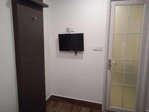 TV a/nebo společenská místnost v ubytování Alia Express Brickfields