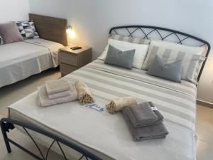 Кровать или кровати в номере Deda Apartments
