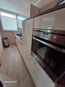 a kitchen with a stainless steel oven at Apartment Bochum in Bochum