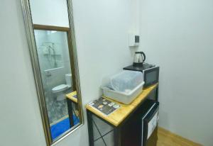 Küche/Küchenzeile in der Unterkunft BaansuanThanisorn&Rolf บ้านสวนธนิสร & ร๊อฟ