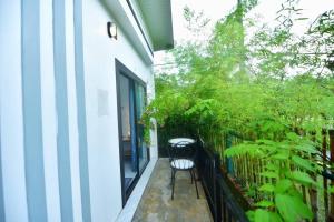 Ein Garten an der Unterkunft BaansuanThanisorn&Rolf บ้านสวนธนิสร & ร๊อฟ